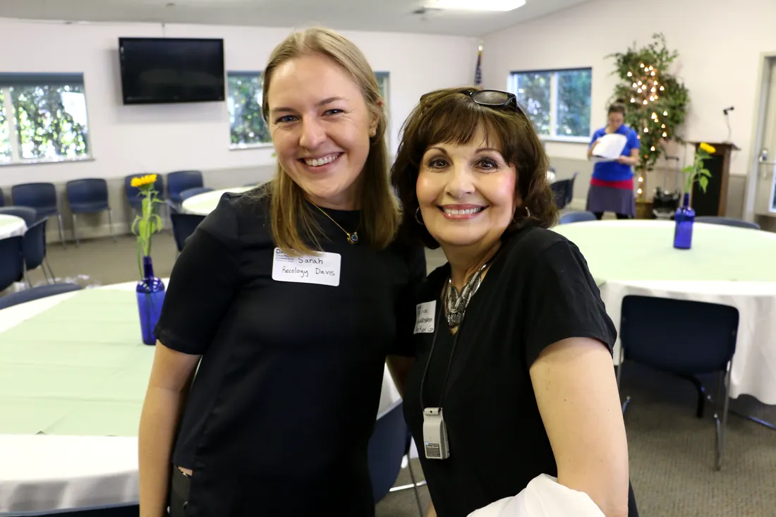Chamber members talking at an evening member social